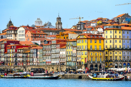 Traditional rabelo boat on the waters of the Douro River, with t