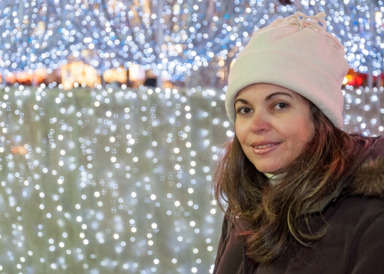 Woman by Christmas Tree