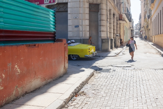 Woman In Cobblestone Street in Havana