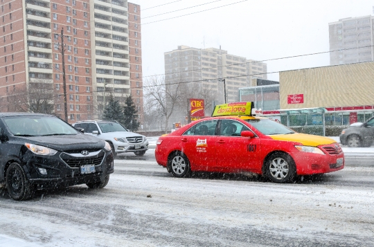 Yellow And A Red Taxi